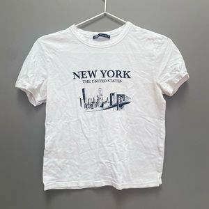 baby t-shirt, but not a literal child’s shirt.